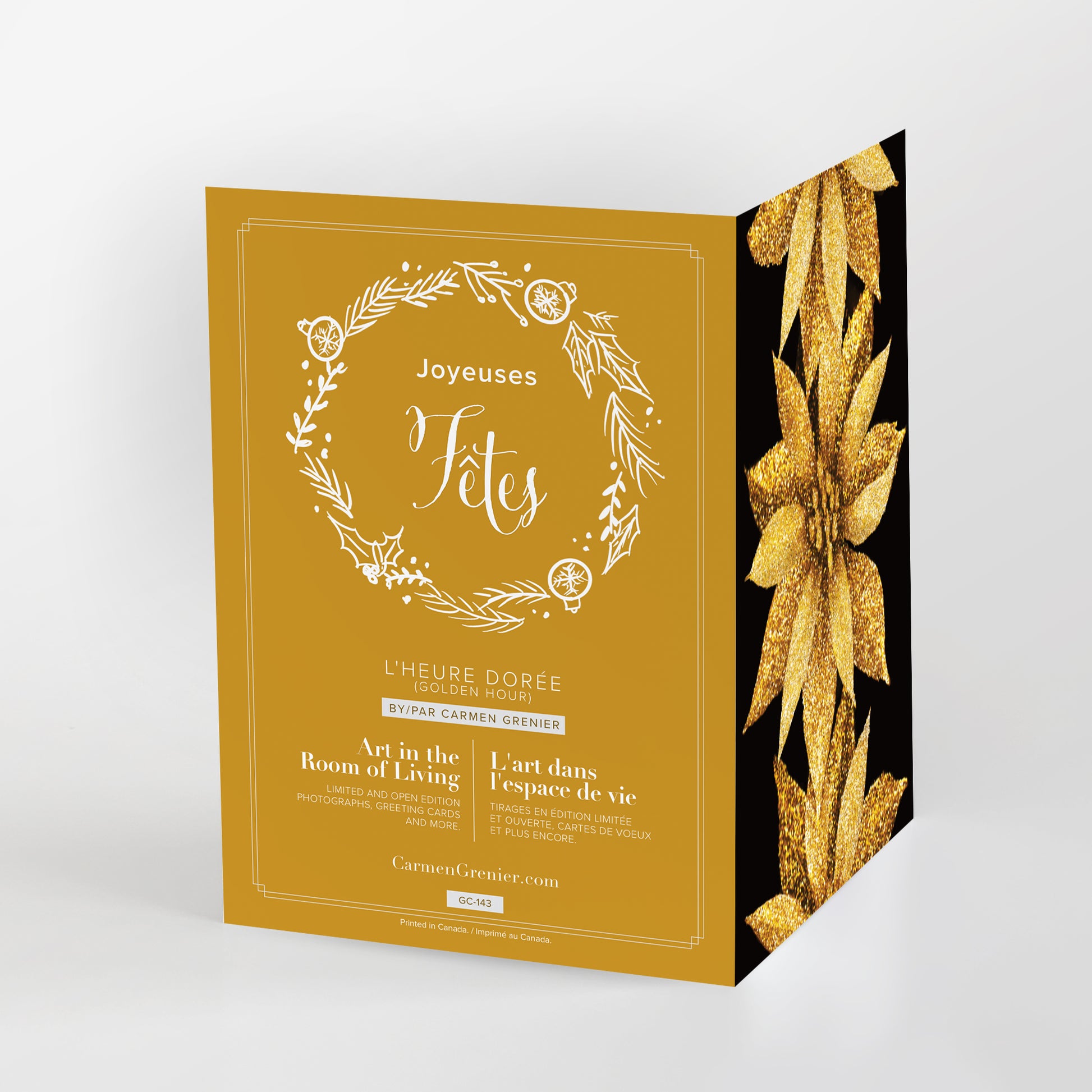 Joyeuses fêtes 'L'heure dorée' greeting card. Three sparkling gold poinsettias on a black background add a touch of elegance to your holiday wishes.