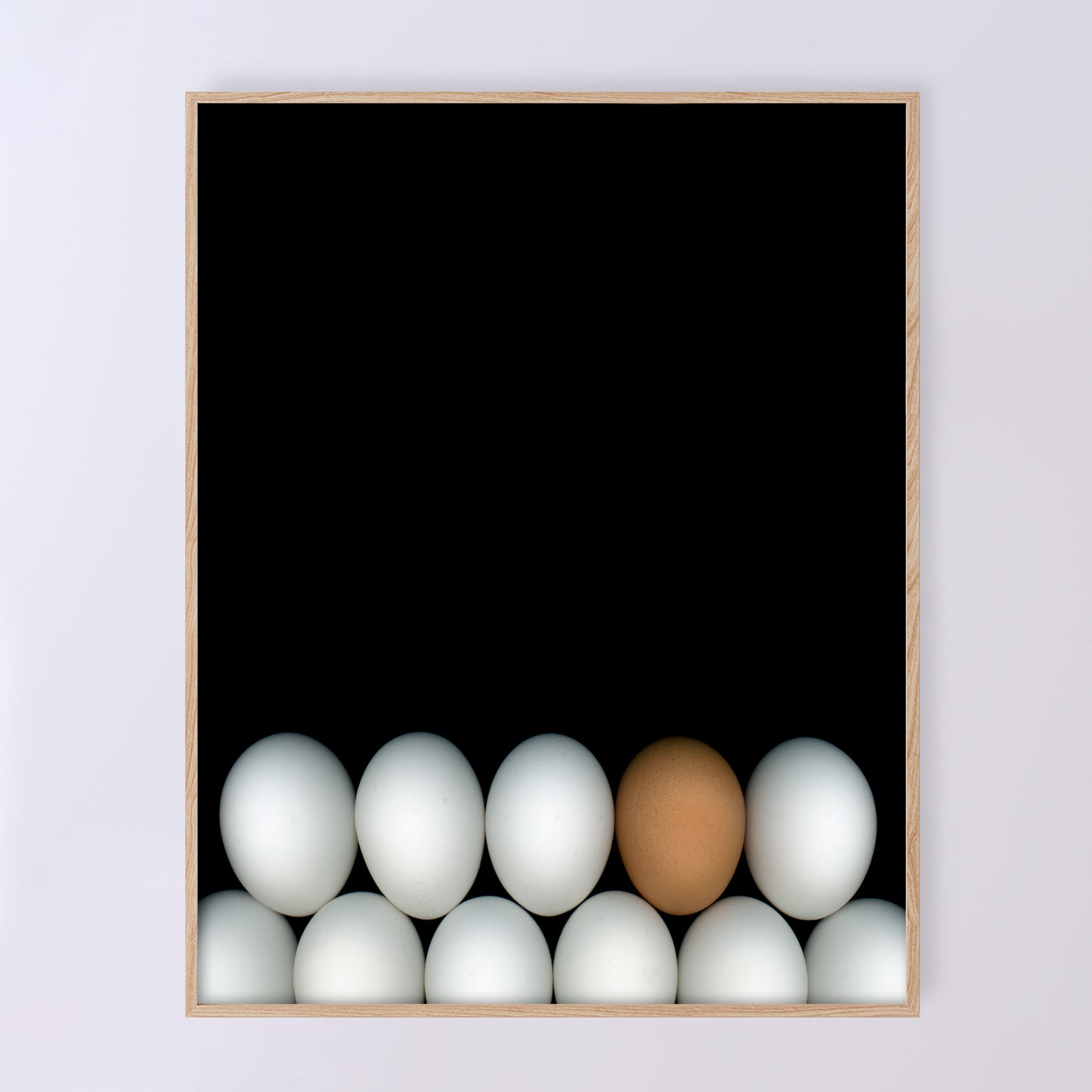 Two rows of white chicken eggs with one brown egg on a black background. Open edition 11x14 inches print by Carmen Grenier. OE-354-2